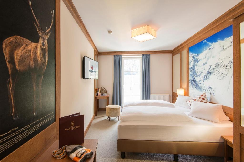 Posteľ alebo postele v izbe v ubytovaní Hotel Eden Rock