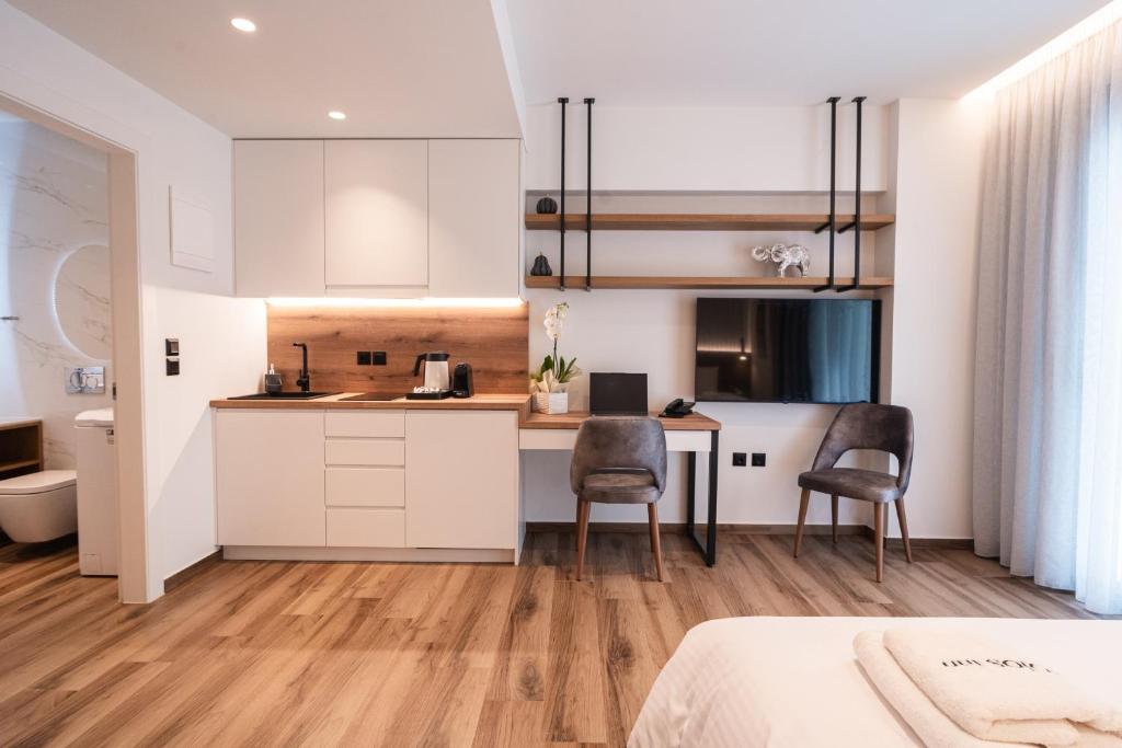 Kuchyň nebo kuchyňský kout v ubytování Volos Inn Hotel