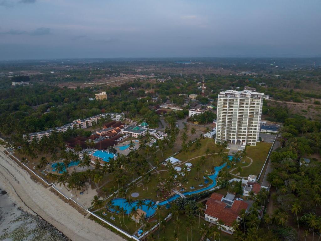 an aerial view of a resort with a large building at Sun N Sand Beach Resort in Mombasa
