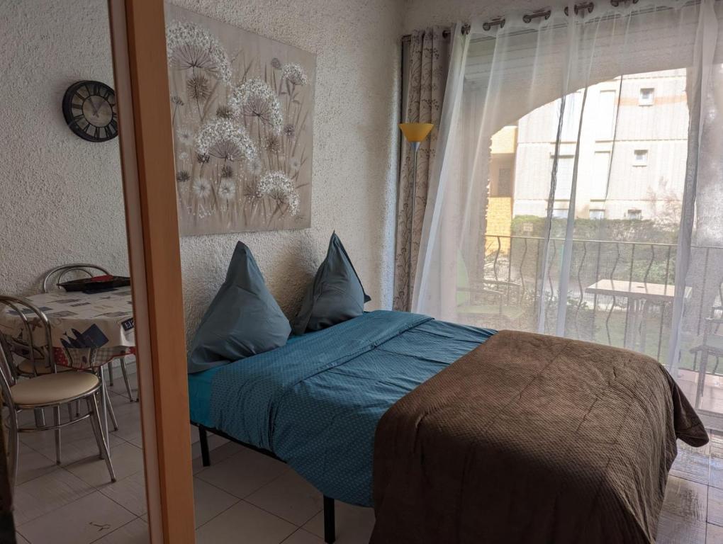 Posteľ alebo postele v izbe v ubytovaní BELLE VUE AU CALME SUR LA PLAGE
