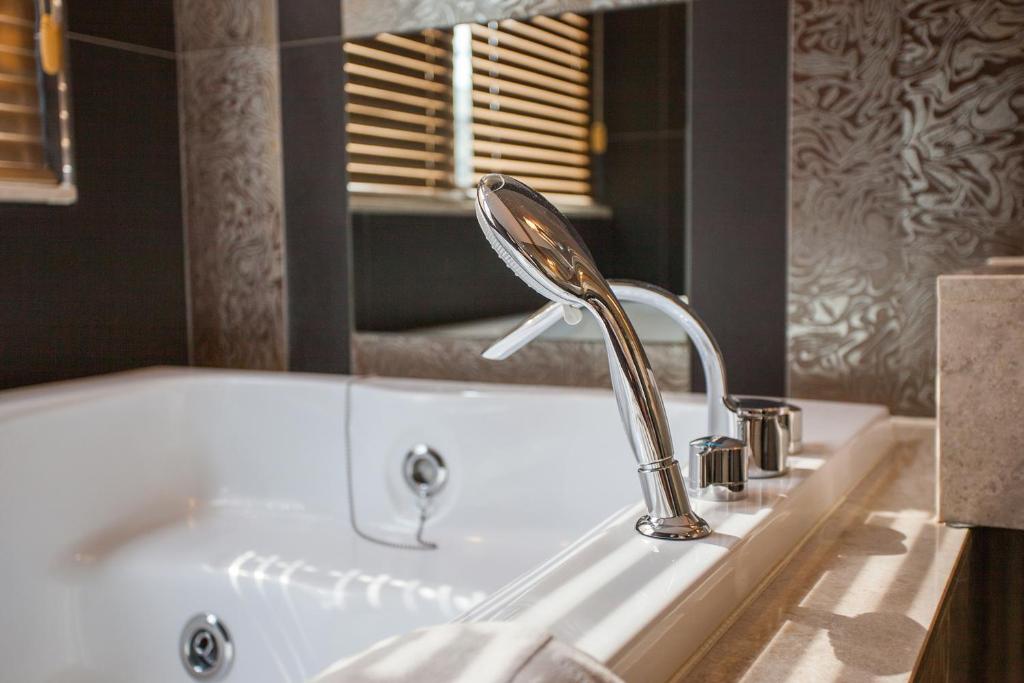 Koupelna v ubytování Hotel Pharos