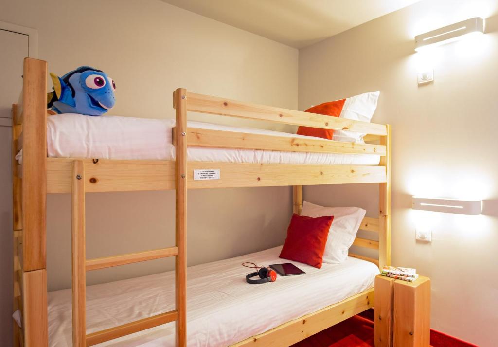 Postel nebo postele na pokoji v ubytování SOWELL HOTELS Le Parc & Spa