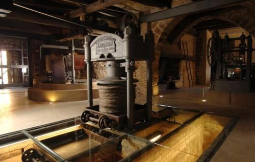 a machine sitting on top of a table in a room at La Premsa Hotel Rural in Cardona
