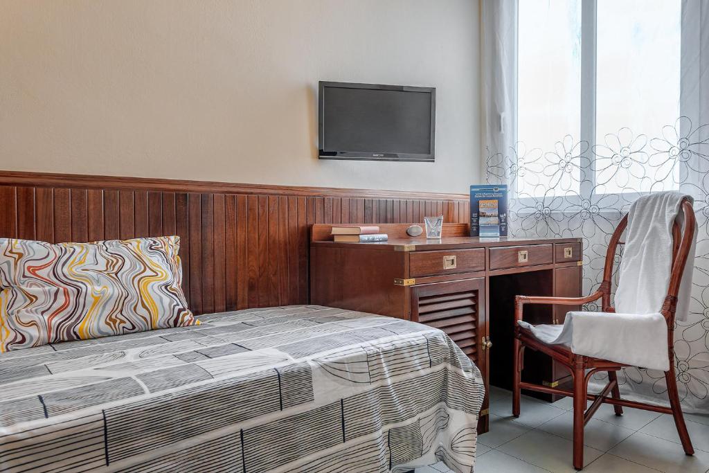 TV a/nebo společenská místnost v ubytování Vintage Hotel Tornese - Business & Events