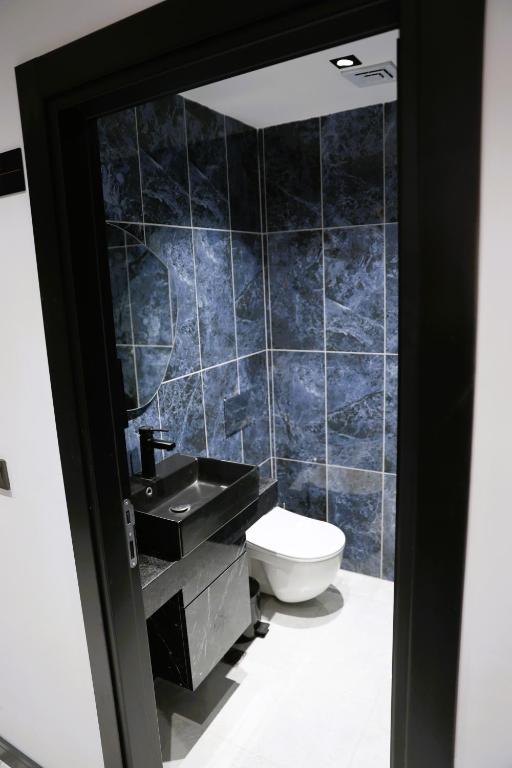 Koupelna v ubytování Aybek Ratio Hotel