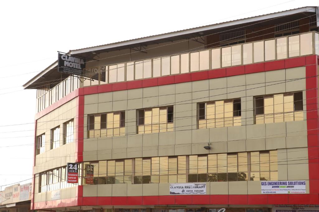 a building with a lot of windows at Motel Clavina in Gilgil