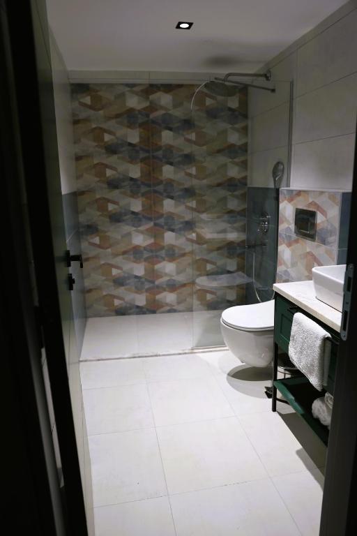 Koupelna v ubytování Aybek Ratio Hotel