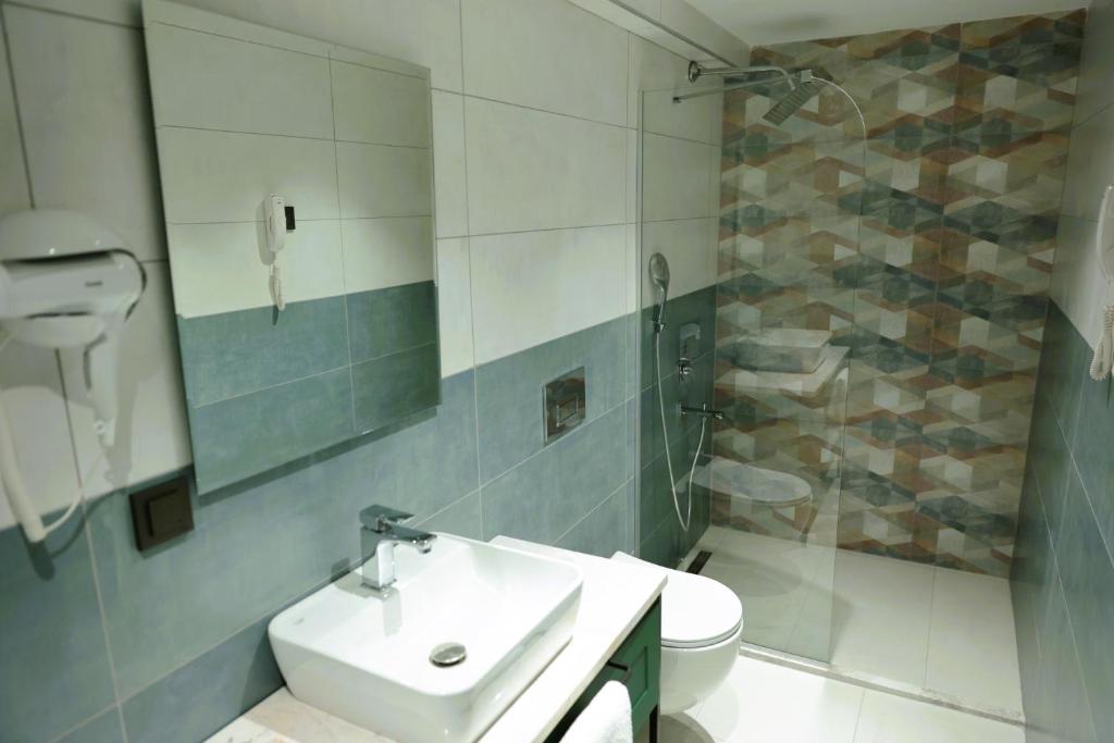 Koupelna v ubytování Aybek Ratio Hotel