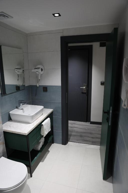 Koupelna v ubytování Aybek Ratio Hotel
