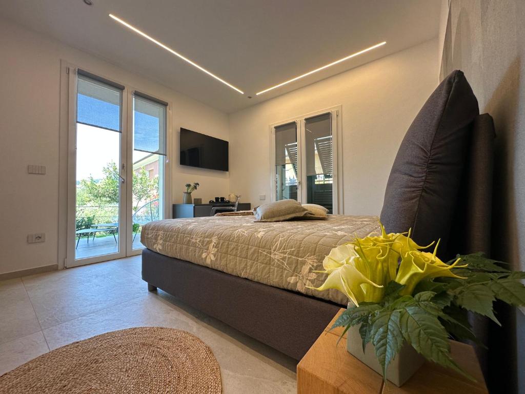 TV a/nebo společenská místnost v ubytování B&B Perla sul mare