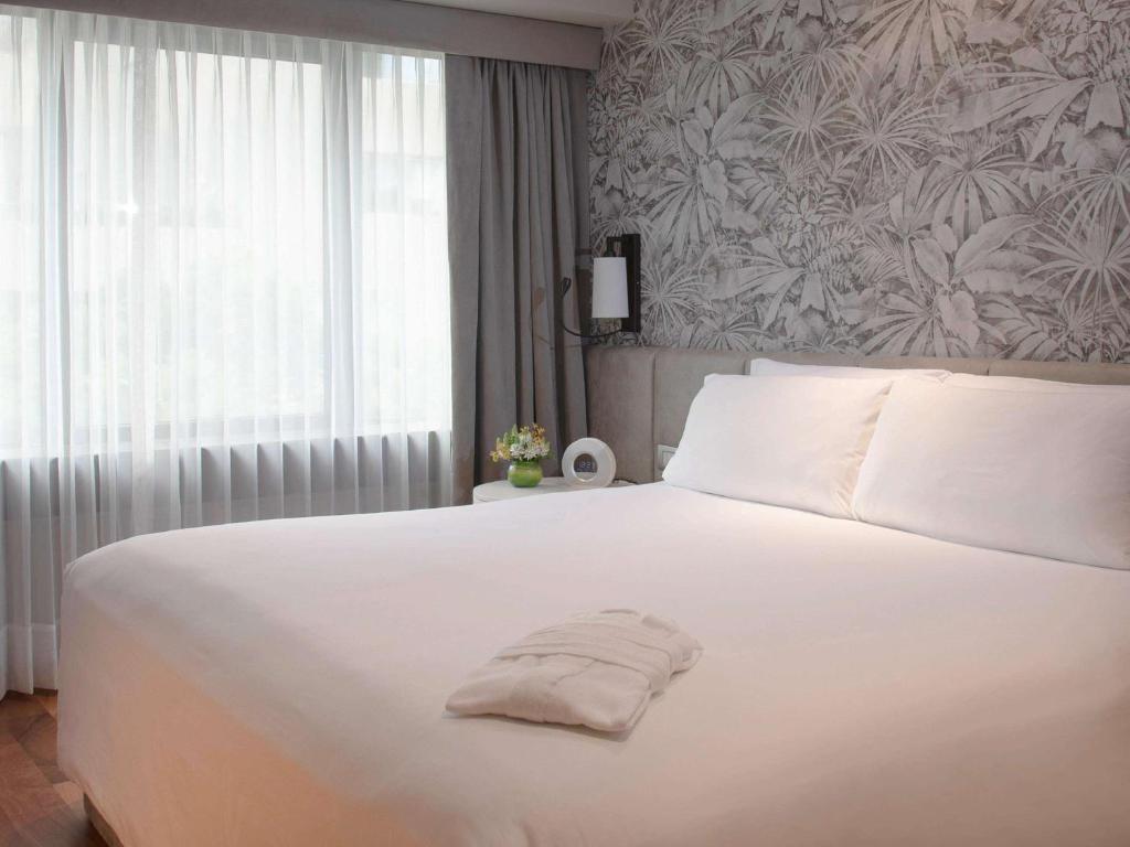 Letto o letti in una camera di Manto Hotel Lima - MGallery Collection