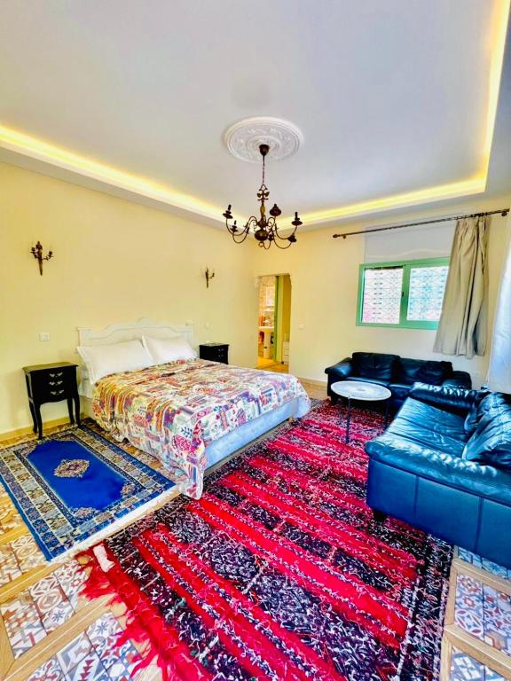 Postel nebo postele na pokoji v ubytování Villa Baddi Marrakech
