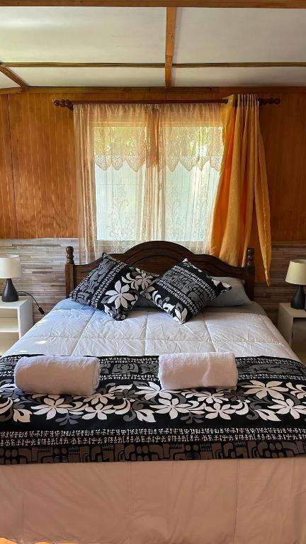 Cama o camas de una habitación en Cabañas Mahatua