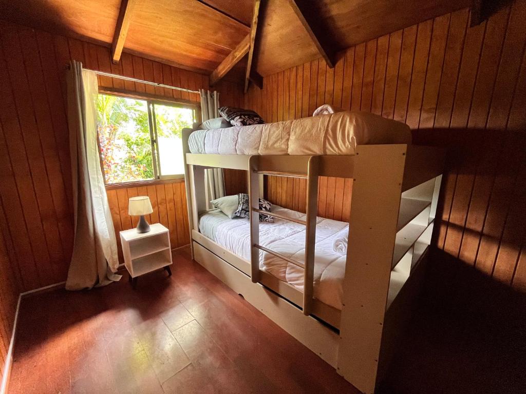 Cama o camas de una habitación en Cabañas Mahatua