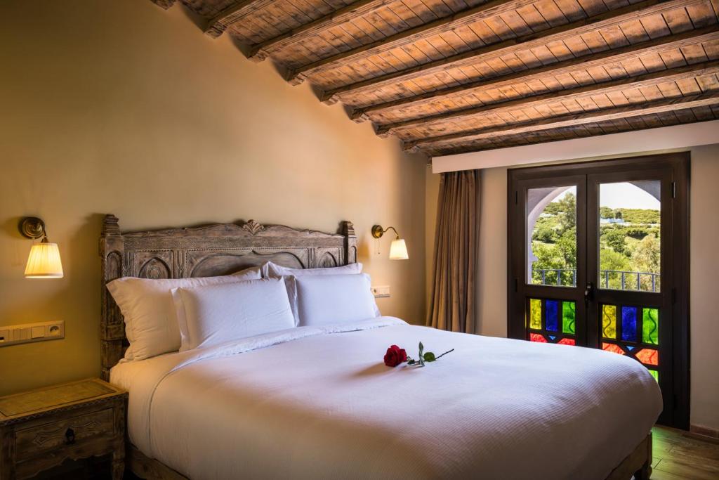 Postel nebo postele na pokoji v ubytování Dar Echchaouen Maison d'Hôtes & Riad