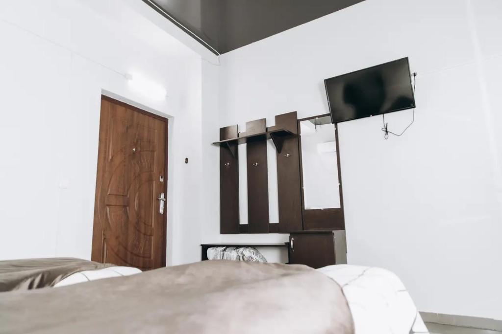 TV a/nebo společenská místnost v ubytování PANORAMA HOTEL