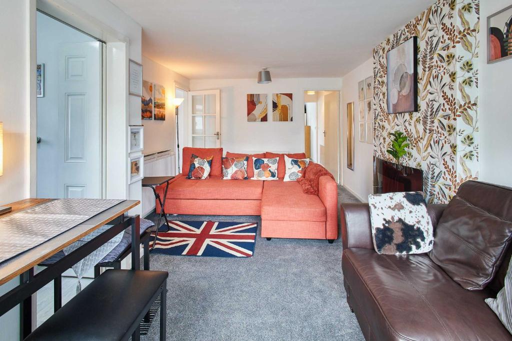 a living room with a couch and a table at Host & Stay - Shaftsbury in Burton Joyce
