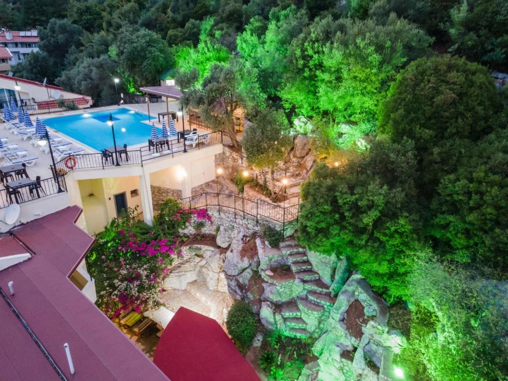 an aerial view of a house with a swimming pool at LESLION HOTEL TURUNC in Marmaris
