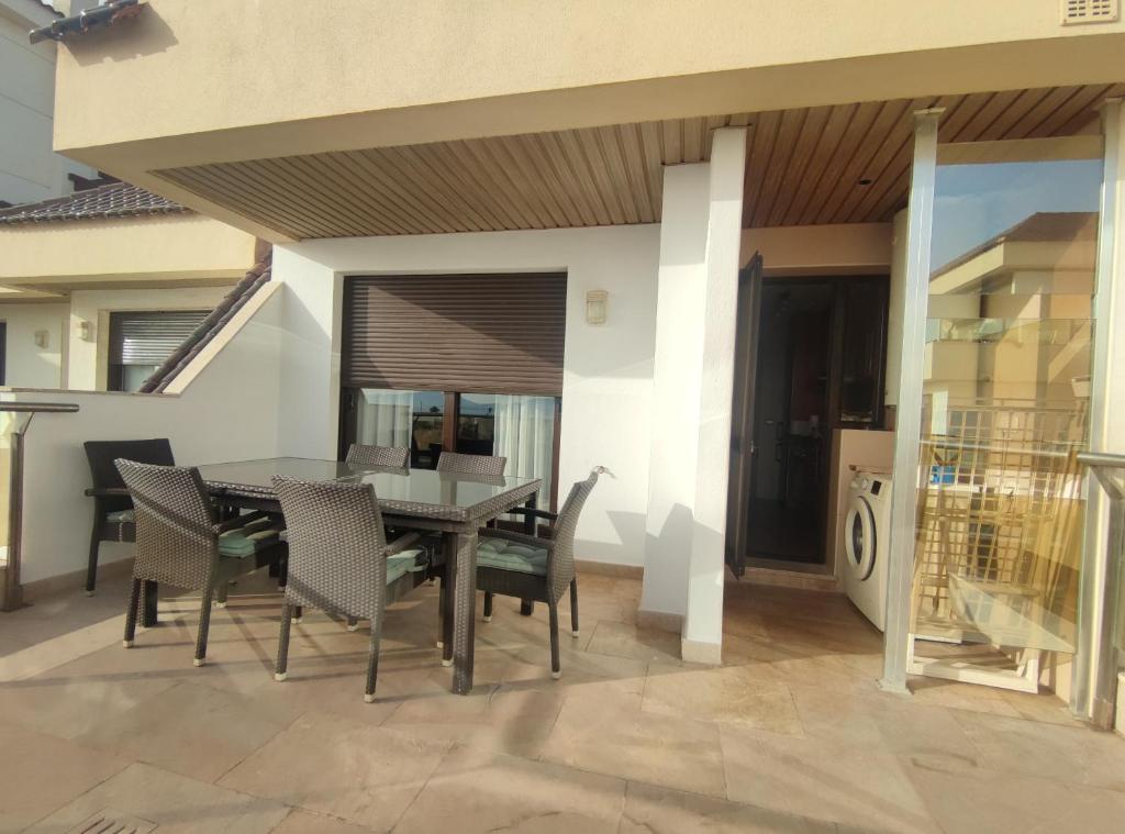 A balcony or terrace at Lovely apartment with pool & sea views - Marina Del Castillo 2129