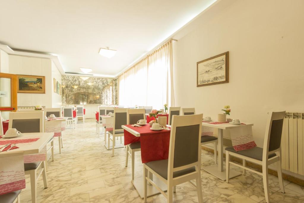 Un lugar para sentarse en Hotel Roma