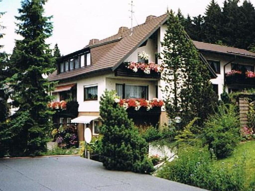 a house with flower boxes on the front of it at Köferl Modern retreat in Fichtelberg