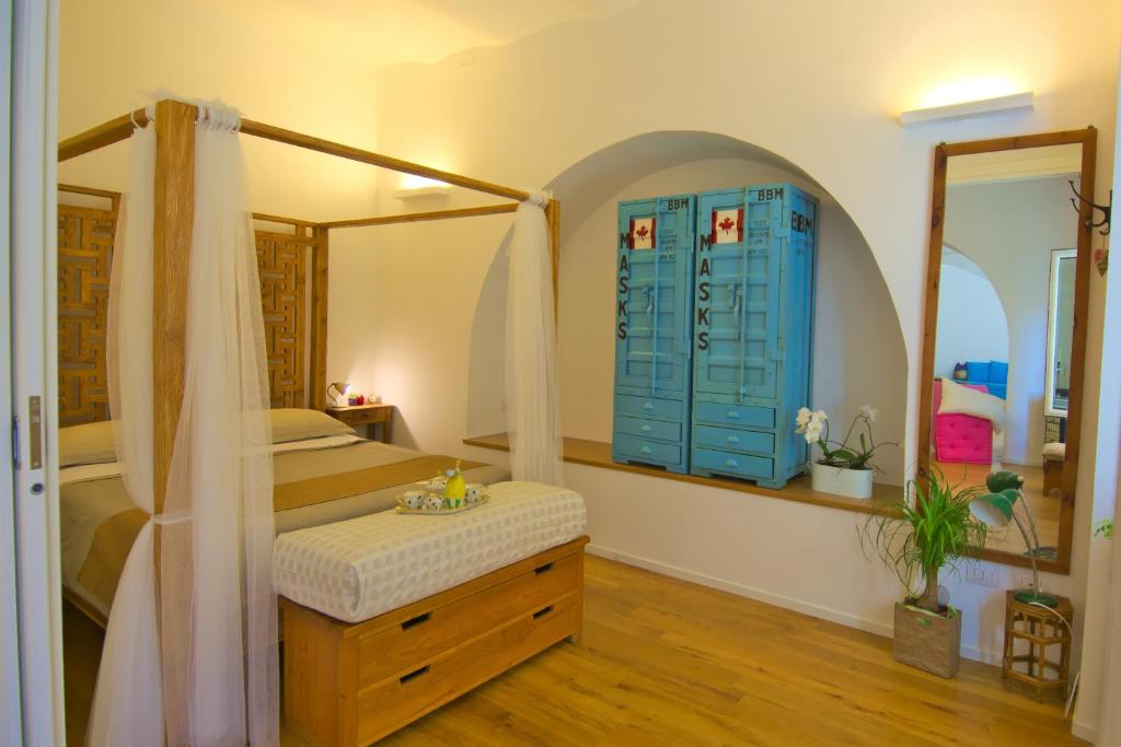 Posteľ alebo postele v izbe v ubytovaní CasaBlanca Apartment
