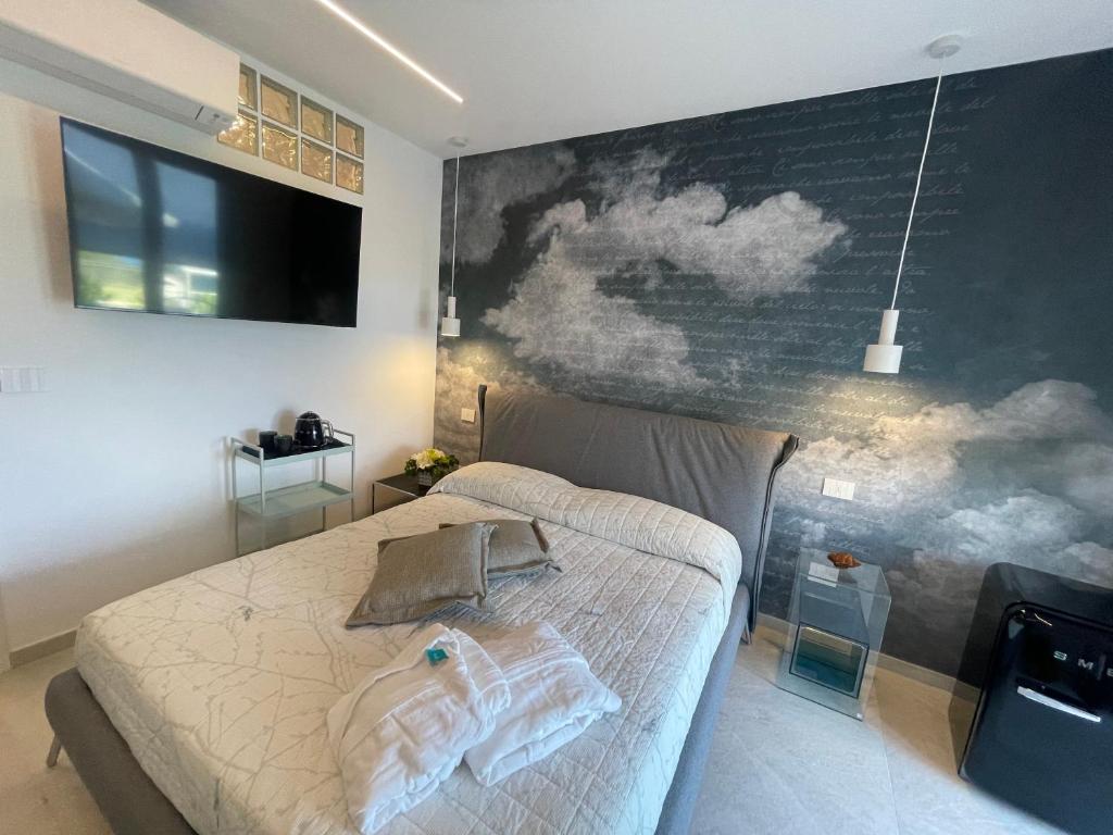 Postel nebo postele na pokoji v ubytování B&B Perla sul mare