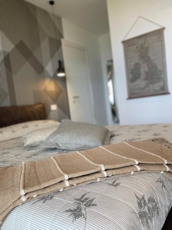 Postel nebo postele na pokoji v ubytování B&B Perla sul mare