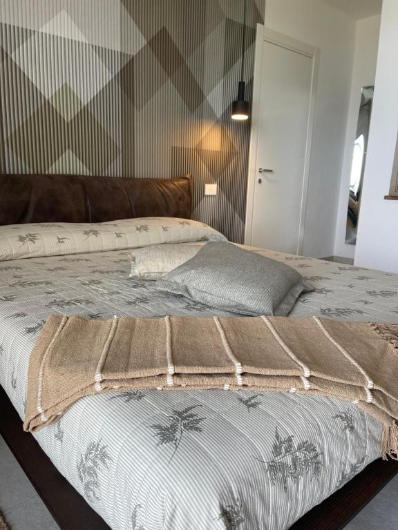 Postel nebo postele na pokoji v ubytování B&B Perla sul mare