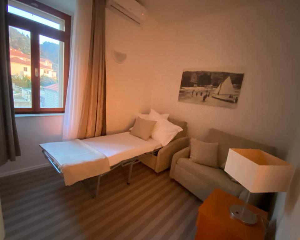 Postel nebo postele na pokoji v ubytování Hotel Glavovic