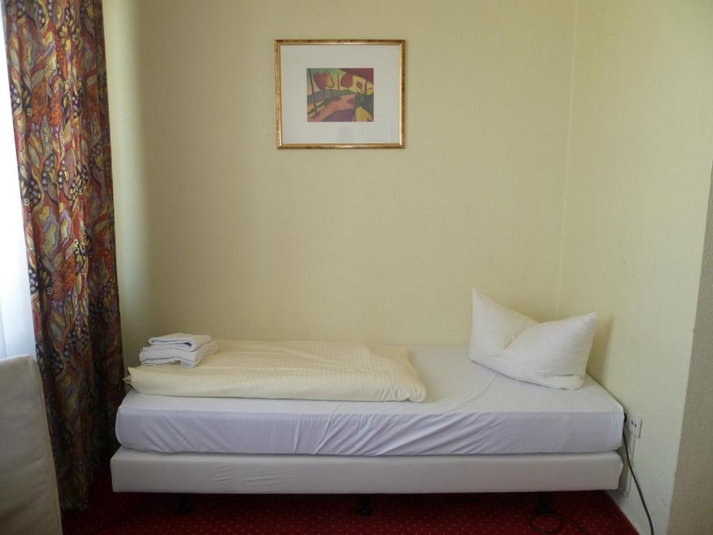 Postel nebo postele na pokoji v ubytování Domo Hotel Mondial