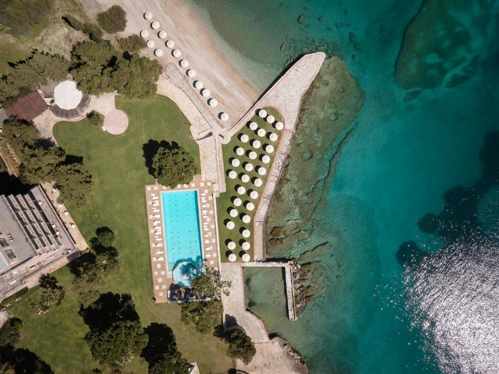 an aerial view of a resort next to the ocean at Kalamaki Beach Resort in Isthmia