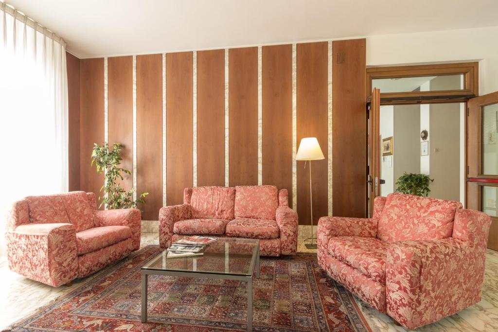 Un lugar para sentarse en Hotel Roma