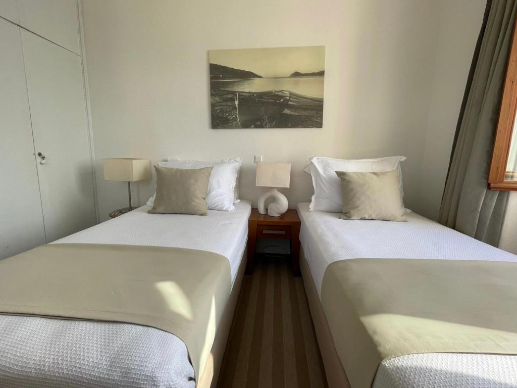 Postel nebo postele na pokoji v ubytování Hotel Glavovic