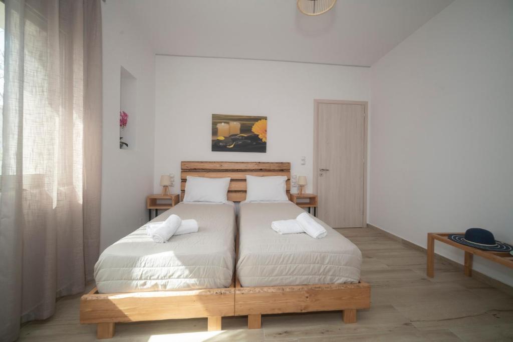 Postel nebo postele na pokoji v ubytování Elixrysos Apartment 1