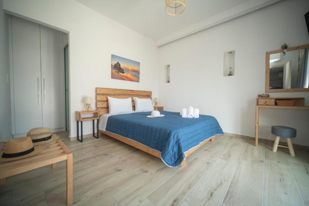 Postel nebo postele na pokoji v ubytování Elixrysos Apartment 1