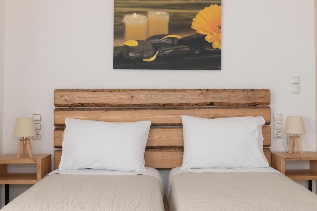 Postel nebo postele na pokoji v ubytování Elixrysos Apartment 1