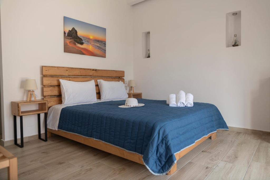 Postel nebo postele na pokoji v ubytování Elixrysos Apartment 1