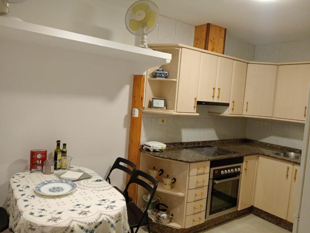 Kuchyň nebo kuchyňský kout v ubytování Apartamento en el Casco antiguo