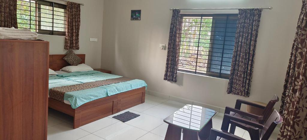 Postel nebo postele na pokoji v ubytování Sugamya Farm Guesthouse