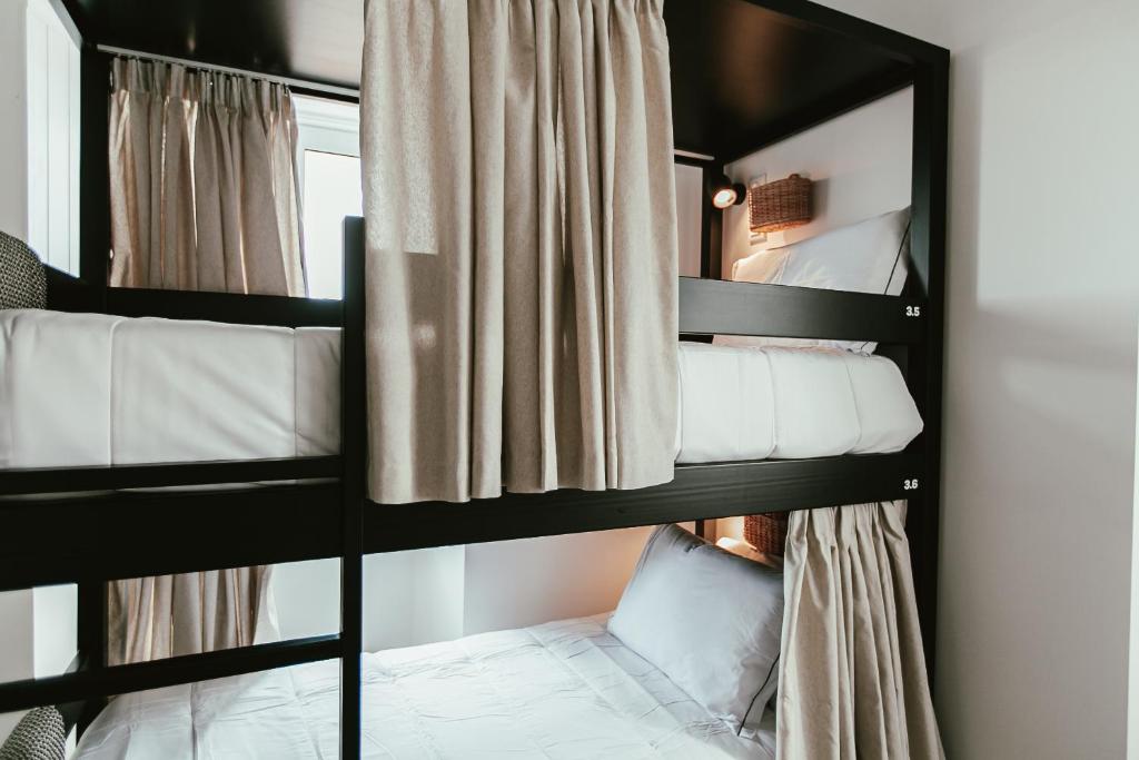 Postel nebo postele na pokoji v ubytování Aires Hostel