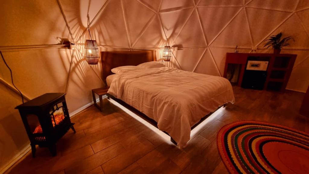 Postel nebo postele na pokoji v ubytování Glamping-Zingo