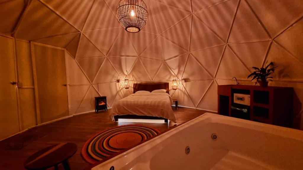 Postel nebo postele na pokoji v ubytování Glamping-Zingo