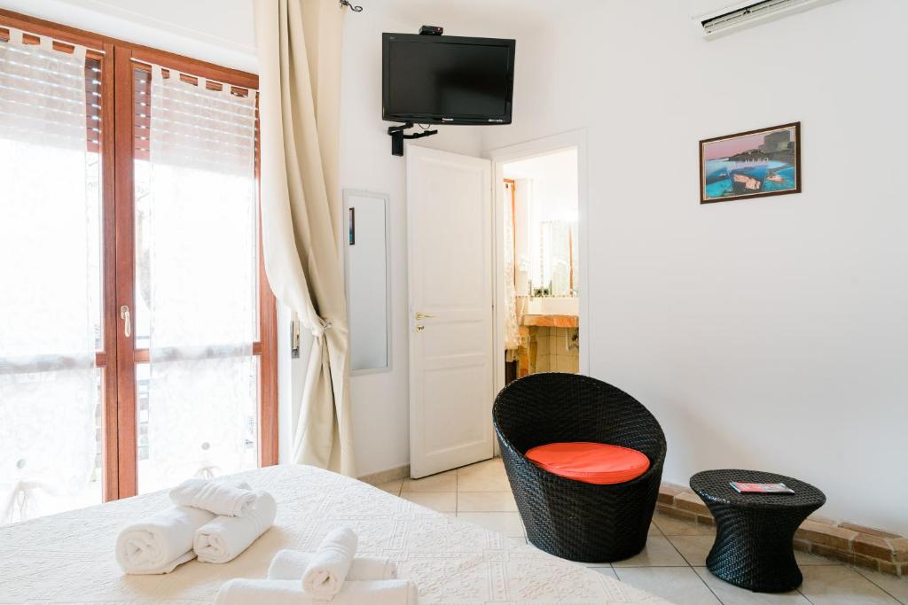 A bed or beds in a room at La Marmora