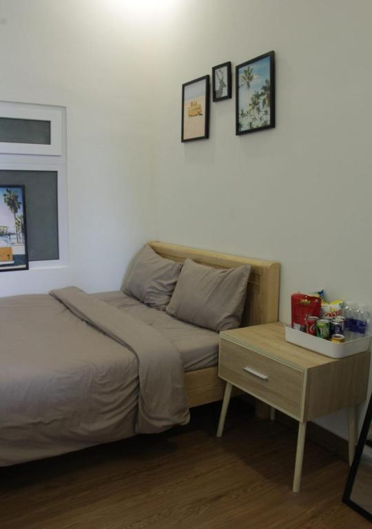 Postel nebo postele na pokoji v ubytování 1909 Home Dalat - Open 24h
