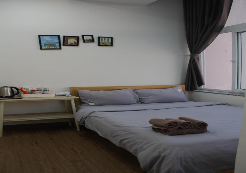 Postel nebo postele na pokoji v ubytování 1909 Home Dalat - Open 24h