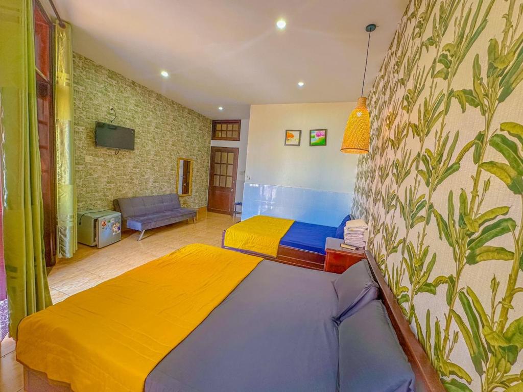 Postel nebo postele na pokoji v ubytování Hoàng Sơn's Home