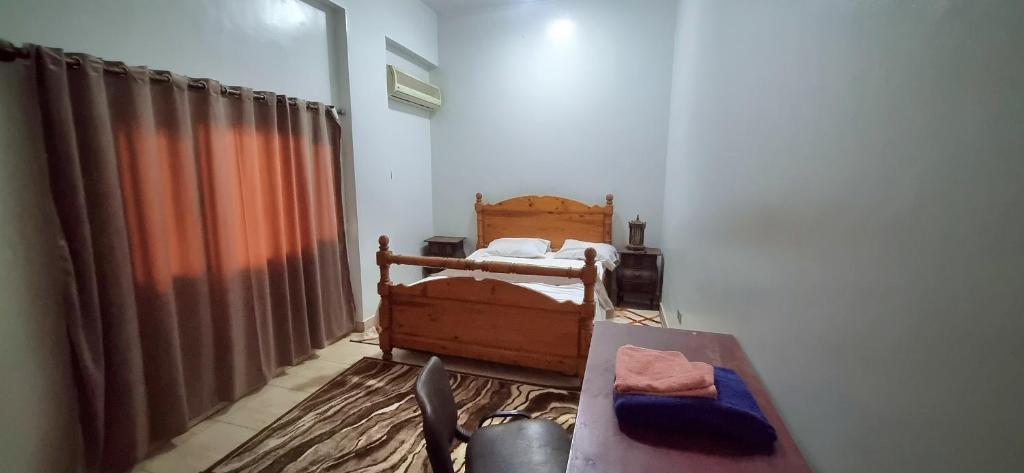 Postel nebo postele na pokoji v ubytování Abo Hisham Nile Flat
