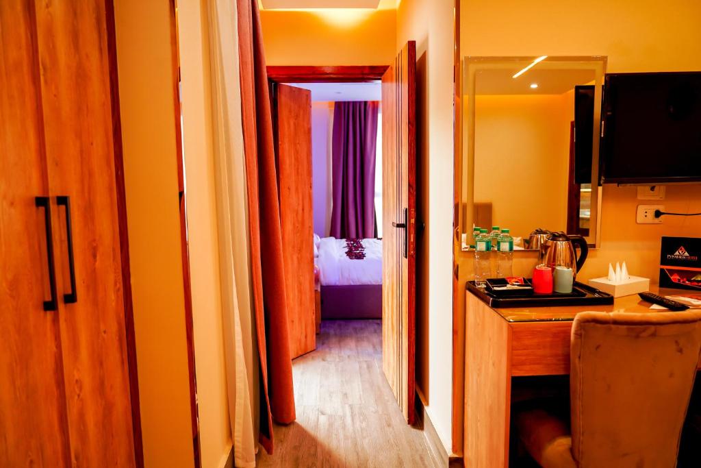 Kuchyň nebo kuchyňský kout v ubytování Pyramids Hotel