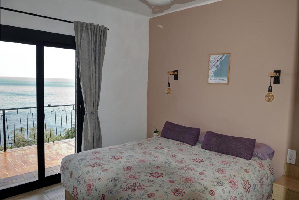 Posteľ alebo postele v izbe v ubytovaní apartamento deluxe cau del llop